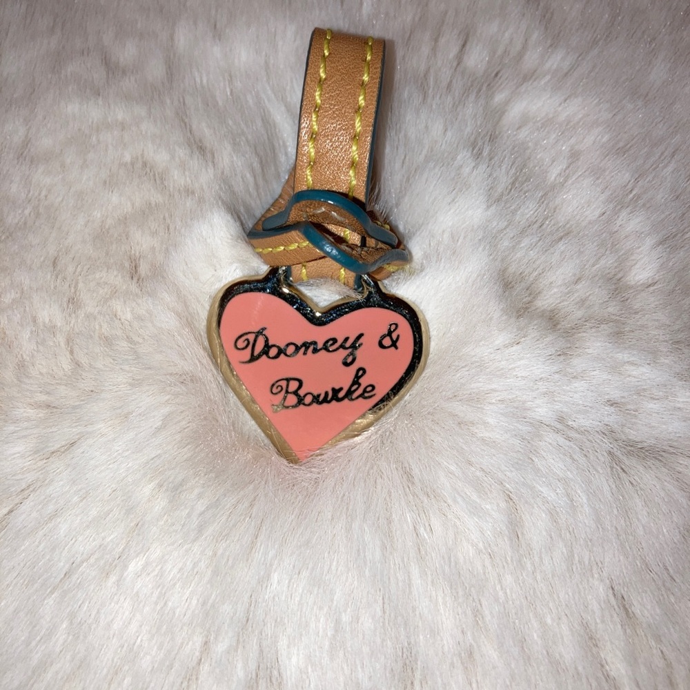 Heart shaped Dooney & Bourk pink tag bag charm